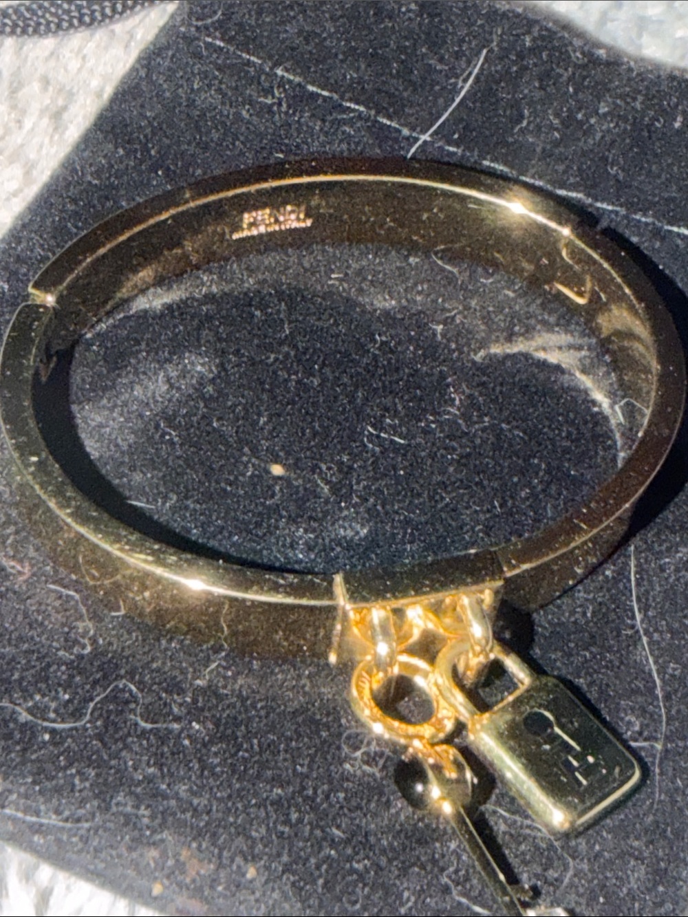 Preloved Fendi Gold-tone Charm Hinge Bangle Bracelet small size 6.5